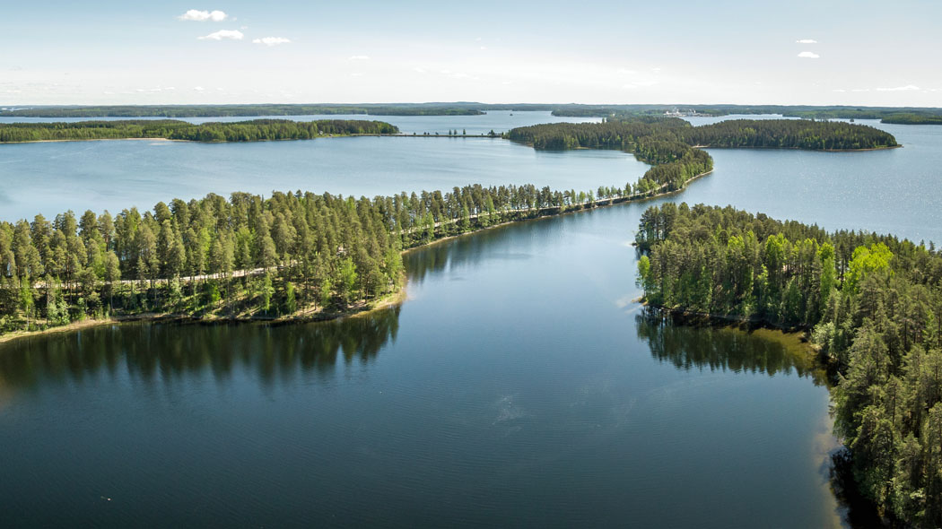 Esker- and lake landscape in the aerial photo on a summer day.