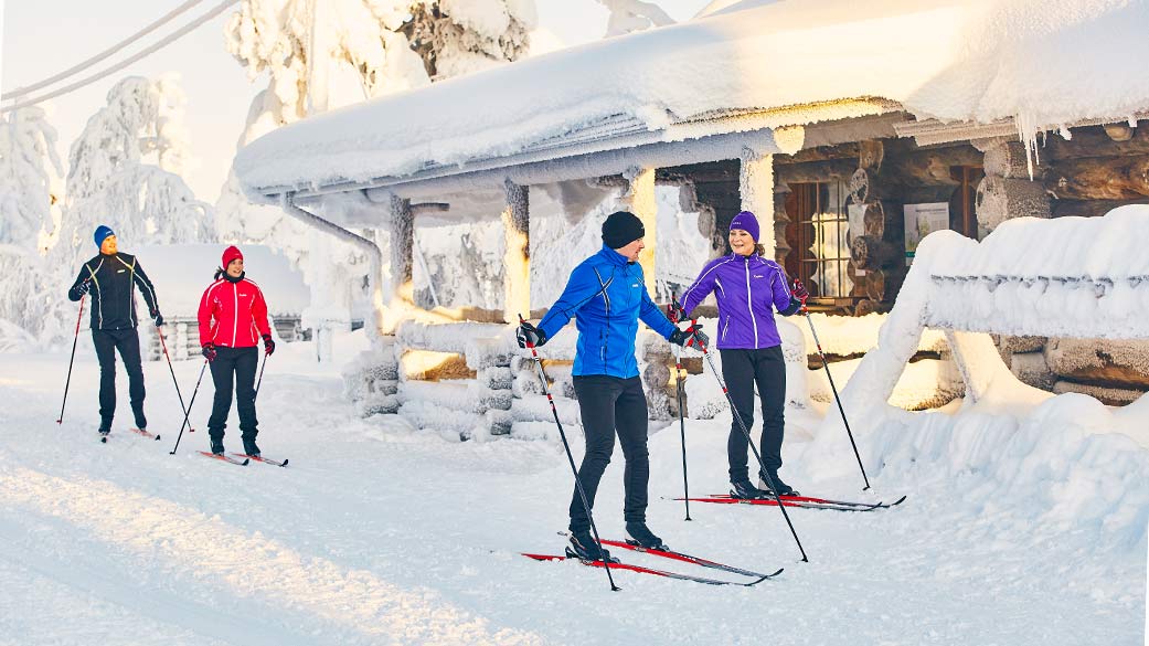 Skiers in front of the Lampivaara wilderness cafe.